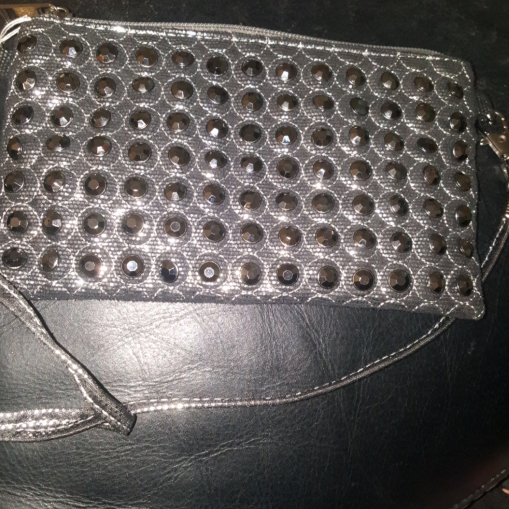 Mylar.  Shiney. stoned. Shoulder strap clutch